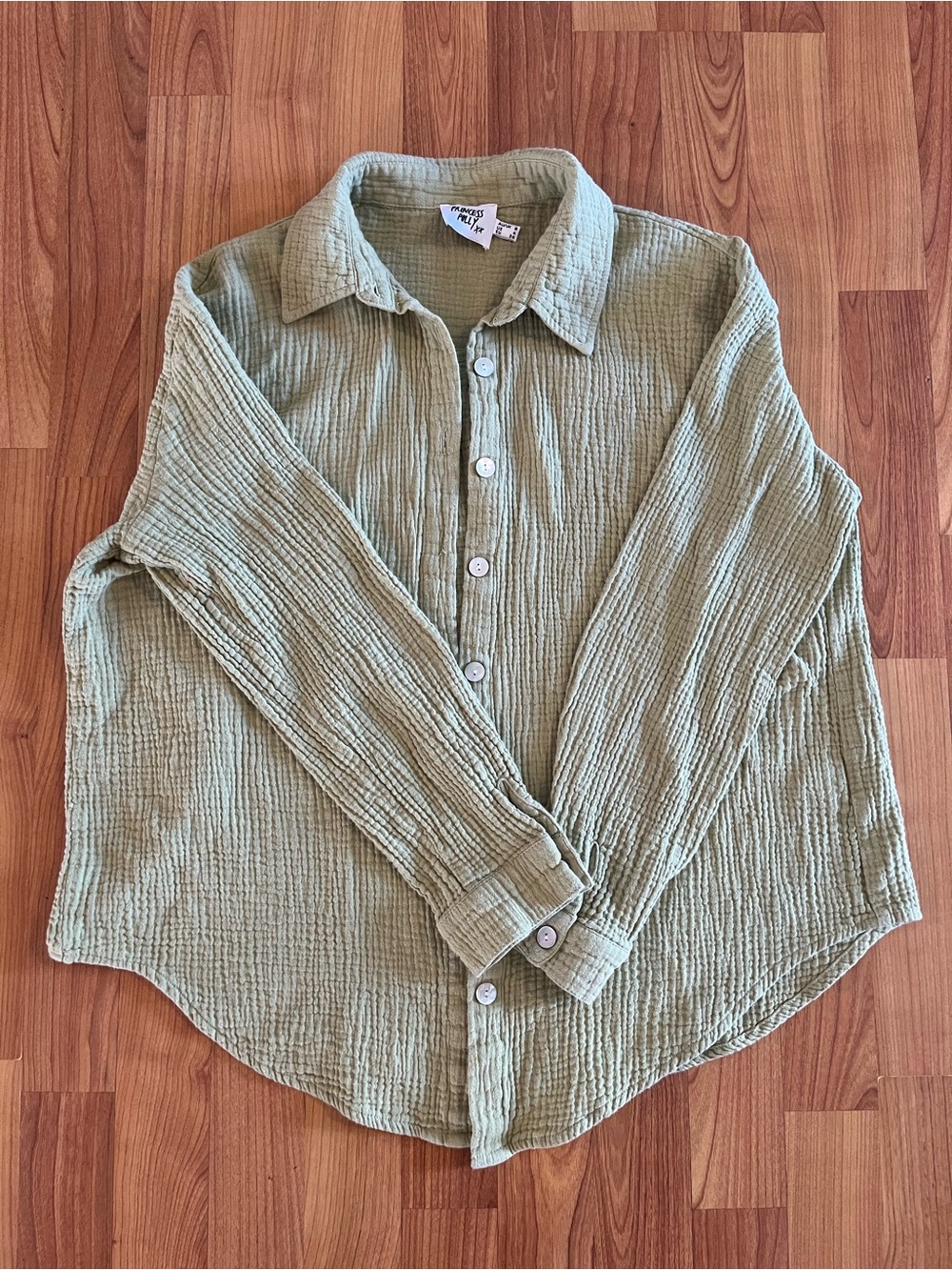 Princess Polly Green Crinkle Button-Down Shirt with pearly buttons